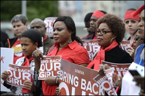 People protest today in support of more than 200 Nigerian girls abducted from their school, in front of the European headquarters of the United Nations, in Geneva, Switzerland.