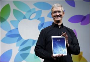 Apple CEO Tim Cook introduces the new iPad Air in San Francisco.