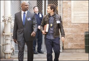 Terry Crews, left, and Andy Samberg in a scene from 