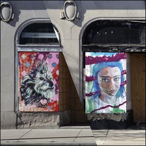 Murals by student and adult artists are sprucing up East Toledo’s business district. LeSo Gallery is spearheading installation of 19 murals on buildings at Starr Avenue near Main Street.