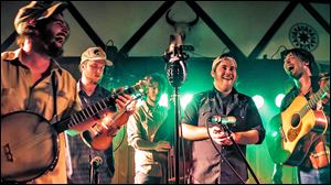 The high-energy bluegrass band from Wisconsin Horseshoes & Hand Grenades will play Tuesday at Martini & Nuzzi’s in Maumee.