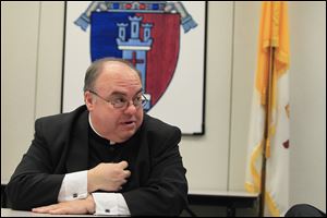 Msgr. Charles Singler, director of vocations for the Catholic Diocese of Toledo.