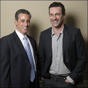 J. B. Bernstein poses with Jon Hamm, who plays him in the film ‘Million Dollar Arm.’