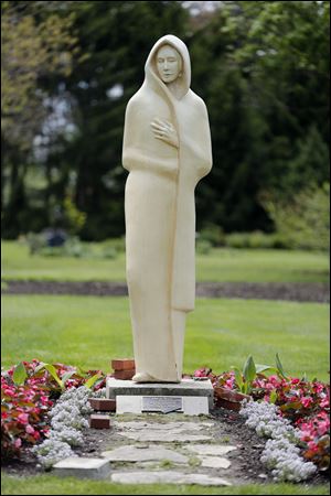 ‘The Cloak,’ a sculpture by the late Joe Ann Cousino graces Schedel Arboretum and Gardens near the Ohio Turnpike where Ottawa and Sandusky counties meet. The garden is gearing up for the season.