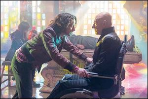 James McAvoy, left, and Patrick Stewart portray present and past versions of Professor X.