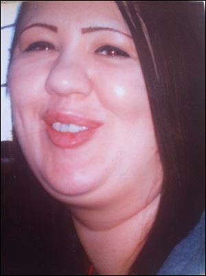 In this undated photo provided by the Mansfield family shows Nicole Lynn Mansfield.