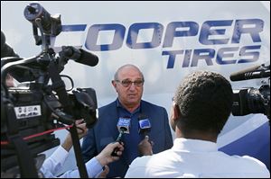 Roy Armes, Cooper Tire & Rubber Co.’s chief executive officer, discusses the tiremaker’s plans after meeting employees during Cooper’s 100th anniversary celebration at it Findlay headquarters.