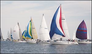Sailboats competing in the the Governor's Cup Course race get underway during the Mills Trophy Race in Lake Erie, Friday, June 8, 2012.  