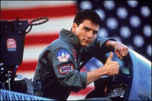 Tom Cruise is shown in a promotional image for the 1986 film, 