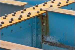 Bolts are used for the new work on the span, whereas rivets had been used originally. The refurbished bridge is to be lighter than the original, which is predicted to extend the life of the span.