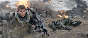 Tom Cruise plays Major William Cage in the sci-fi action-thriller ‘Edge of Tomorrow.’