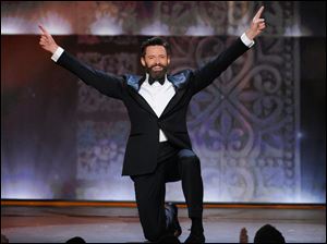 Host Hugh Jackman performs onstage at the 68th annual Tony Awards at Radio City Music Hall on Sunday in New York. 