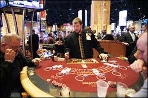 Greg Stockard deals cards at a blackjack table at Hollywood Casino Toledo, which posted revenue of $16.2 million in May.