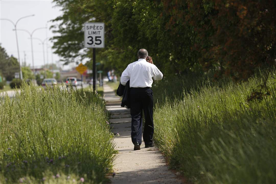 CTY-uglytoledo-south-man-walking