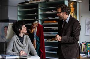 Juliette Binoche and Clive Owen  in a scene from ‘‍Words and Pictures.’ 