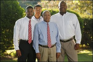 Theo Hill with his sons Chris, left, and Eric and Grandson Vincent, 17.