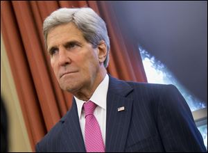 Secretary of State John Kerry said Washington is “open to discussions” with Tehran if the Iranians can help end the violence and restore confidence in the Iraqi government. 