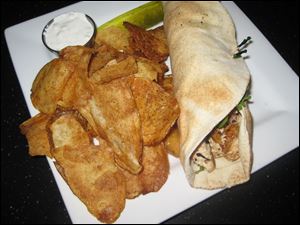 Chicken Gyro with hand cut fresh chips.