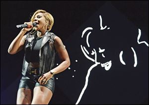 Singer Mary J. Blige performs during day 3 of the 2014 Coachella Valley Music & Arts Festival at the Empire Polo Club on April 13 in Indio, Cali.
