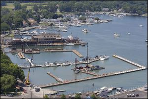 Boats fill B dock as work is done on A and C docks. The area is getting new water, electric, and walking/​docking structures.