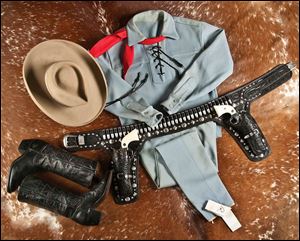 This photo provided by A & S Auction Company of Waco, Texas shows the outfit Lone Ranger actor Clayton Moore wore when he made appearances as the character after retiring from television.