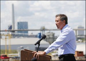 Kasich offers his support of a dredging strategy for the Toledo Harbor during an event at the Toledo Shipyard on Front Street.