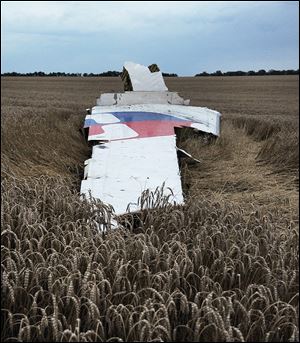 The wreckage of Flight 17 is strewn over a field near the town of Hrabove, in rebel-held east Ukraine. 
