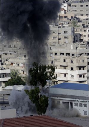 Smoke rises after an Israeli missile strike in Gaza City, in the northern Gaza Strip.