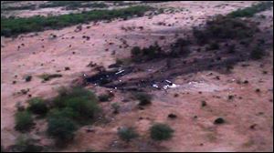 This photo provided by the French army shows the site of the plane crash in Mali. Terrorism hasn't been ruled out as a cause, although officials say the most likely reason for the catastrophe that killed all on board is bad weather. 