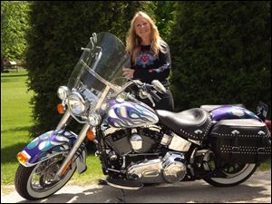 Becky Brown, founder of the women’s motorcycle club called Women in the Wind, started the club 35 years ago in Toledo. Ms. Brown has been inducted into three motorcycle halls of fame.