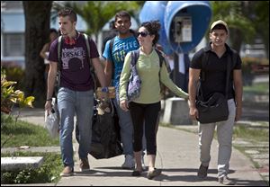 Cuban students exit Marta Abreu Central University in Santa Clara, Cuba.  Venezuelans and Peruvians were deployed to Cuba’s college campuses. Their mission, documents and interviews show, was to recruit university students with the long-term goal of turning them against their government.