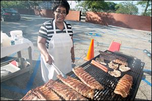 Charlotte Hall treats Toledo Club members to her popular ribs dinner prior to the club temporarily closing for maintenance for August.Charlotte Hall treats Toledo Club members to her popular ribs dinner prior to the club temporarily closing for maintenance for August.