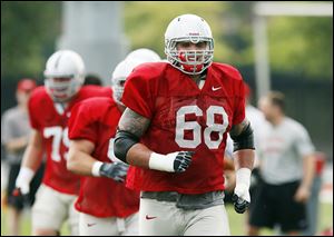 Junior Taylor Decker will move from right tackle to left tackle this season. He’s the only holdover along OSU’s offensive line.