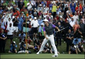 Rory McIlroy celebrates after winning the PGA Championship golf tournament at Valhalla Golf Club on Sunday.