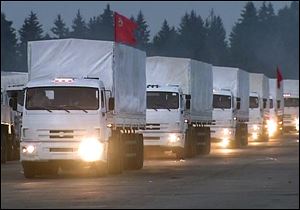 A convoy of white trucks with humanitarian aid leaves Alabino, outside Moscow today, headed for eastern Ukraine one day after agreement was reached on an international humanitarian relief mission.