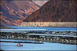 The bathtub ring of light minerals that delineates the high water mark on Lake Mead is seen at Hemenway Harbor in the Lake Mead National Recreation Area in Nevada on July 18. A 14-year drought has caused the water level in the reservoir to shrink to its lowest point since it was first filled in the 1930s.