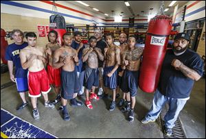 Glass City Boxing Gym team members from left: coach Dave Rayman, Elias Moreno, Angelo Snow, DeAndre Ware, Jr., coach Gabe Morris, Wesley Tucker, coach Ray Vargas, Jamal Brown, Jeremy Caughhorn, Tyler McCreary, and coach Lamar Wright, Jr. are ready for Friday’s nine-bout card.