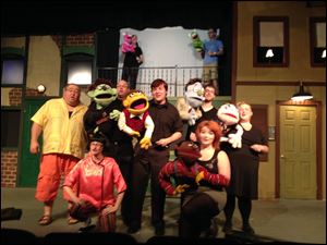 Cast members rehearse a scene in ‘‍Avenue Q,’ the musical comedy that teaches that adulthood is not as fun as it looks. The Fort Findlay Playhouse production opens tonight.