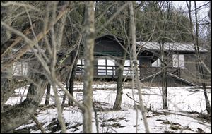 The former 2,800-square-foot home of author J.D. Salinger sits among trees in Cornish, N.H.