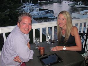 Gregg Gwynn and Jaclyn Foutz of Pittsburgh dine on the Touche Balcony at Chez Francois in Vermillion. The five star dining was a real experience.  