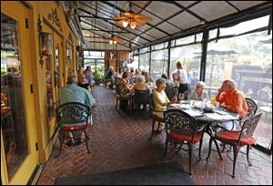 Patrons enjoy the patio at Rosie's Italian Grille.