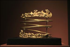 A spiraling torque from the second century A.D., is displayed as part of the exhibit called The Crimea - Gold and Secrets of the Black Sea, at Allard Pierson historical museum in Amsterdam.