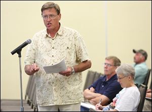 Randy Rohm speaks during a hearing in Fremont on the removal of the Ballville Dam. Thursday’s meeting was hosted by the Ohio EPA.