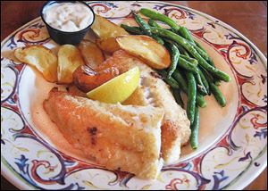 Fried walleye, served with fingerling potatoes & vegetable