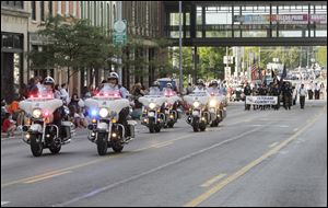 The motorcycle unit of the Toledo Police Department leads the Toledo Labor Day Parade.