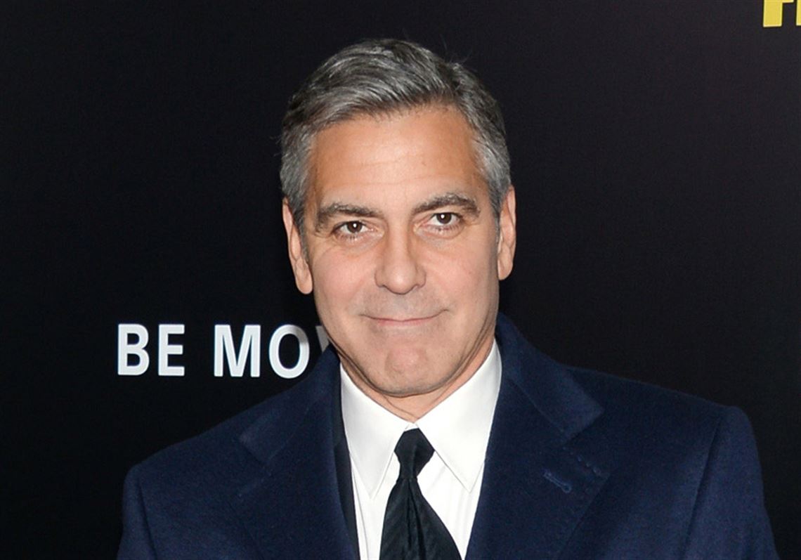 Amal Clooney Wears Goldenrod Dress and Matching Hat at Royal Wedding -  George and Amal at Prince Harry and Meghan's Wedding, image size:1140x797