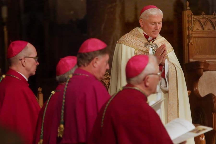 Bishop22-head-bowed-in-prayer