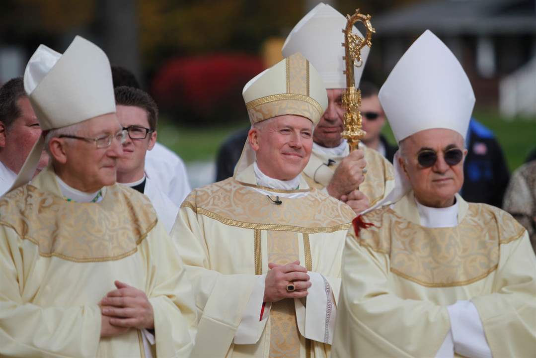 CTY-BIshop23Archbishop-Paul-Blair-far-left-stands-with-soon-t