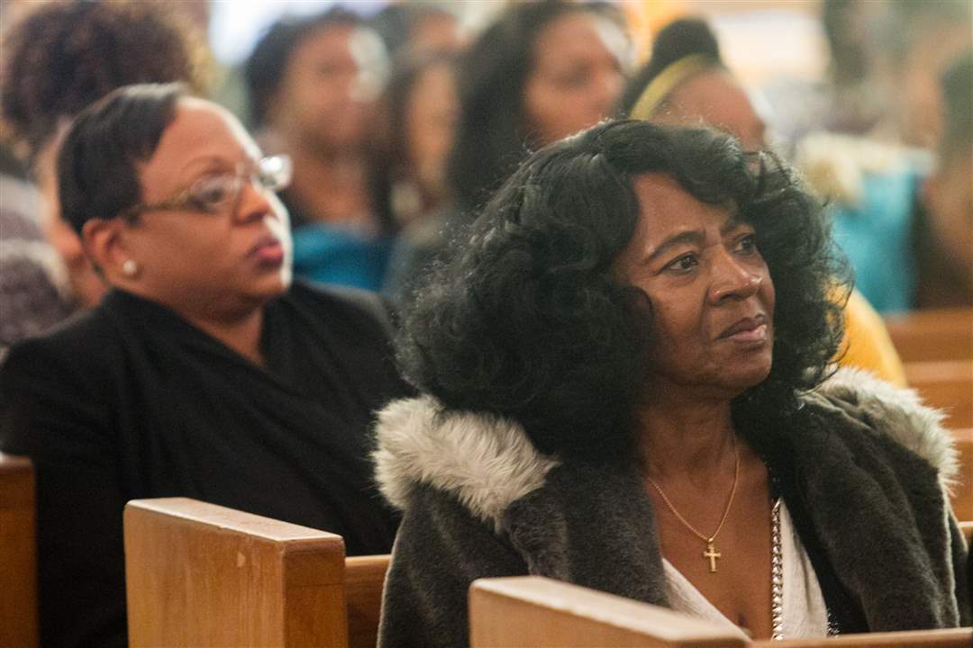 FEA-taylor02pGloria-Taylor-listens-at-the-Sunday-service