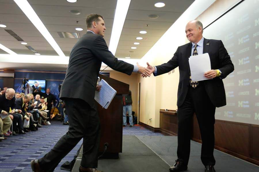 SPT-michigan-harbaugh-shake-hackett